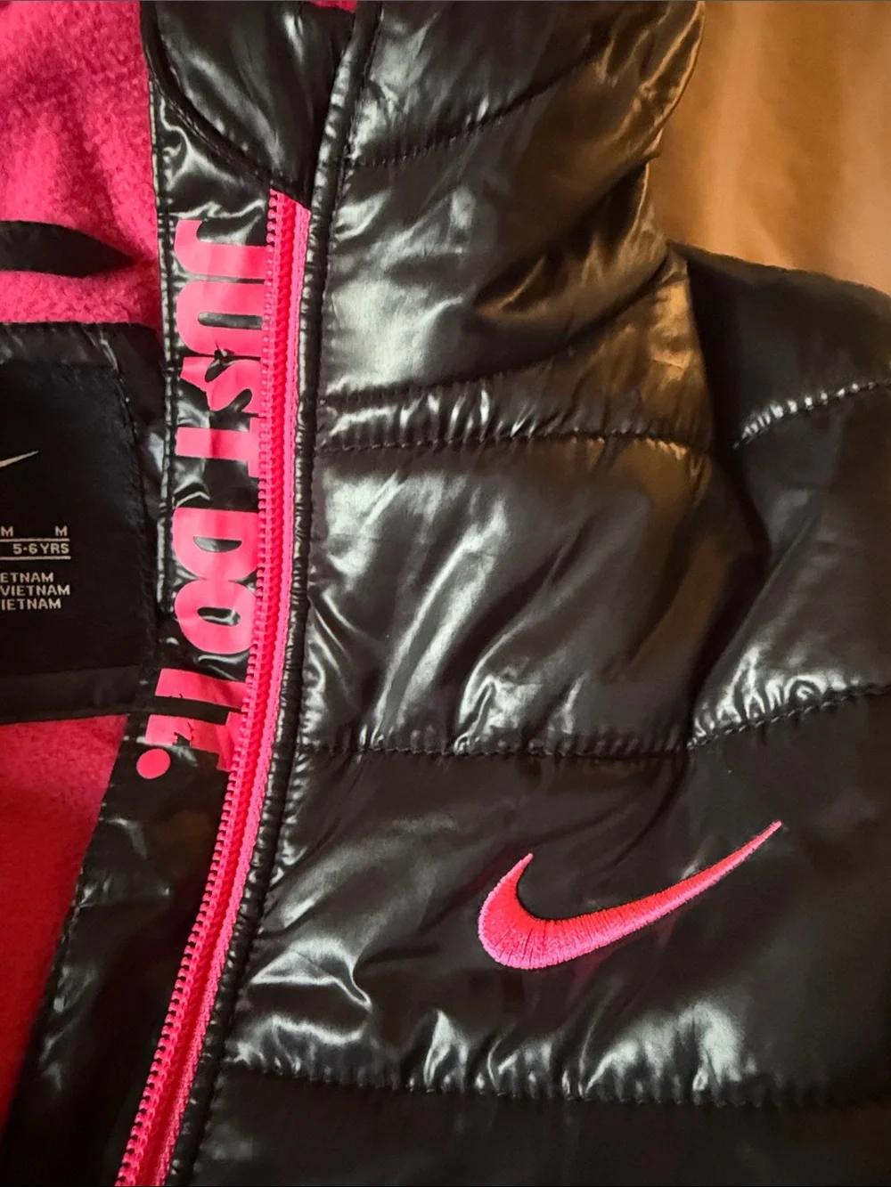 Nike Black Puffer Jacket with Pink Trim for Kids